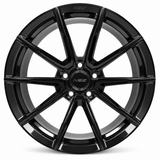 NES FG-06 wheel in Gloss Black with NES center cap, straight-on front view