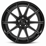 NES FG-12 wheel in Gloss Black with NES center cap, straight-on front view