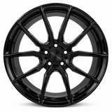 NES FG-13 wheel in Gloss Black with NES center cap, straight-on front view
