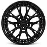 NES FG-15T wheel in Gloss Black with NES center cap, straight-on front view