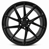 NES FG-16 wheel in Gloss Black with NES center cap, straight-on front view