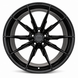 NES FG-18 wheel in Gloss Black with NES center cap, straight-on front view
