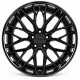 NES FG-XT wheel in Gloss Black with NES center cap, straight-on front view