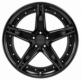 NES JA-01 wheel in Gloss Black with NES center cap, straight-on front view