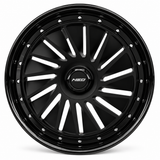 NES JA-X wheel in Gloss Black with NES center cap, straight-on front view