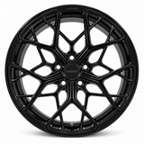 NES MS-6 wheel in Gloss Black with NES center cap, straight-on front view