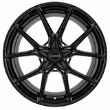 NES ST-1 wheel in Gloss Black with NES center cap, straight-on front view